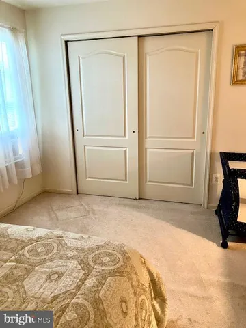 a view of a storage & utility room with a door