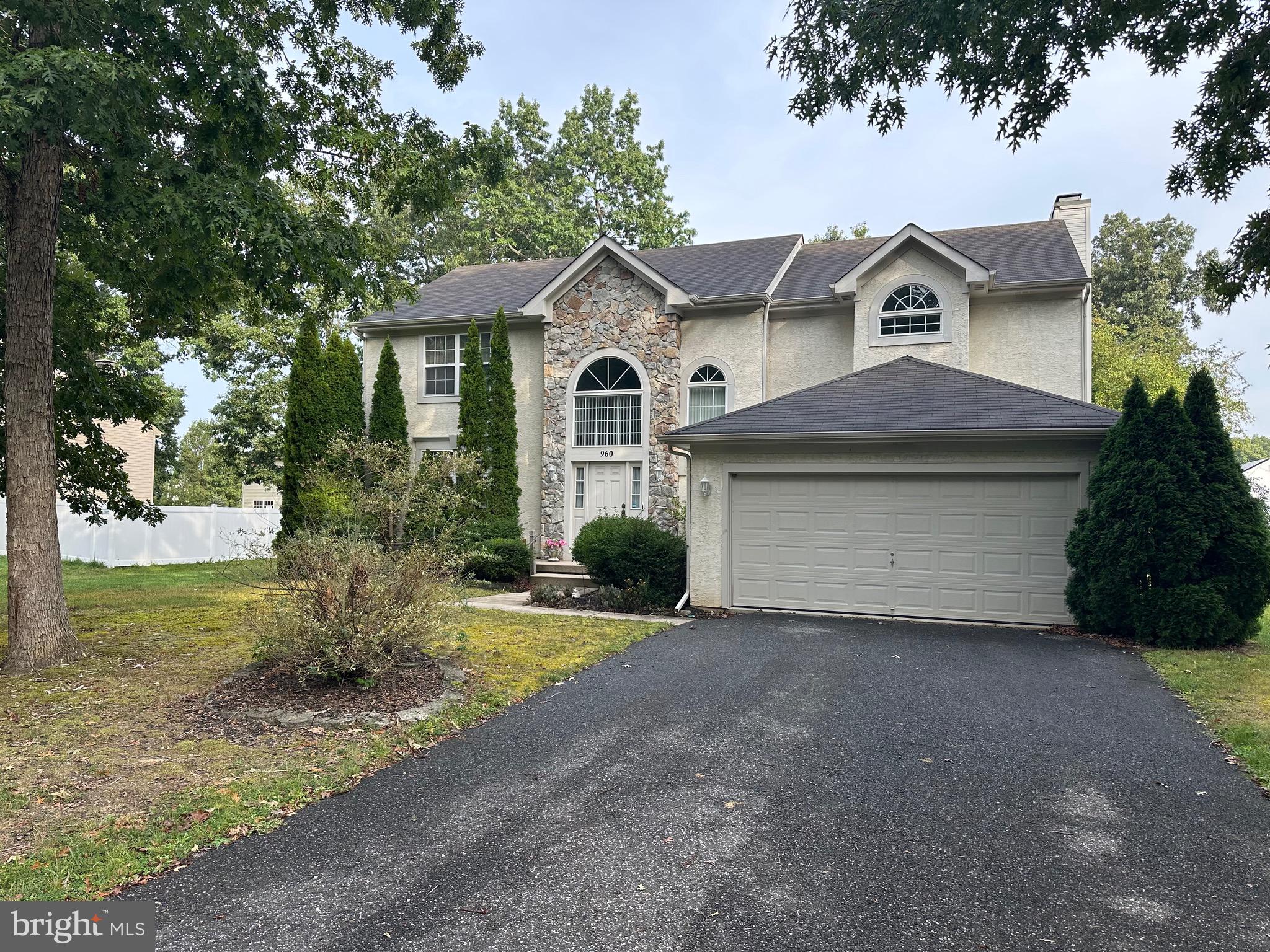 960 Butler Drive Williamstown, NJ 08094 - Photo 41 of 44 a front view of a house with garden