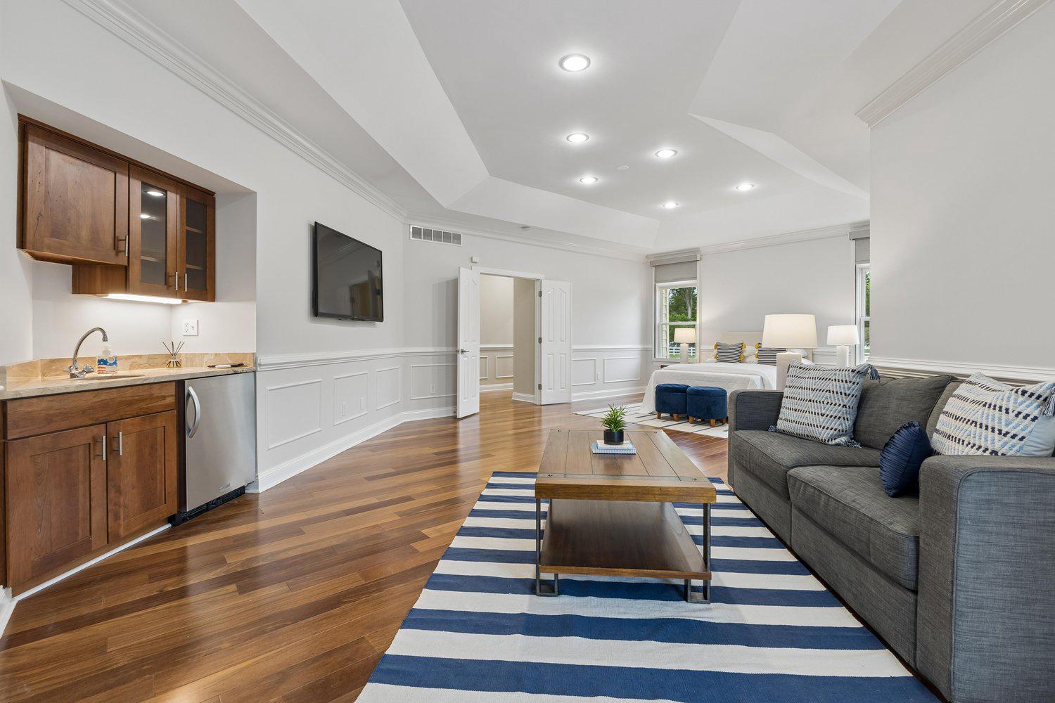 313 Wye Road Queenstown, MD 21658 - Photo 56 of 132 Primary Suite with bar and sitting area.