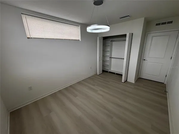 a kitchen with stainless steel appliances a refrigerator and a stove