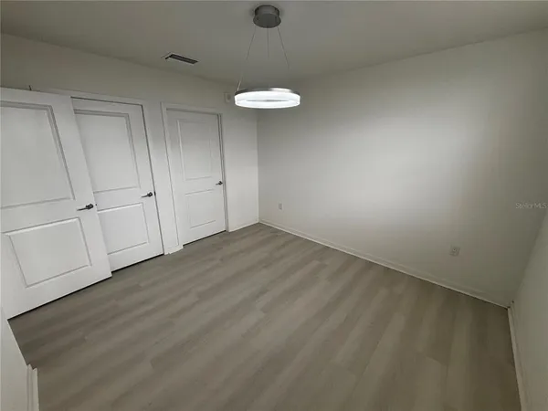 a bathroom with a toilet and a bathtub