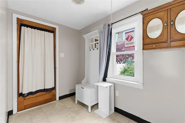 a view of an entryway with a window