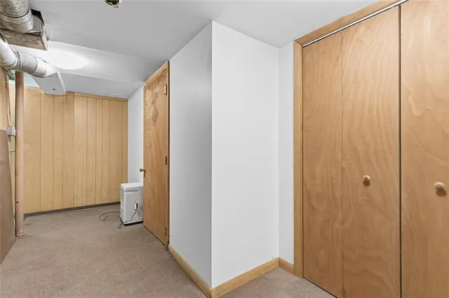 a view of bathroom with a shower and a toilet
