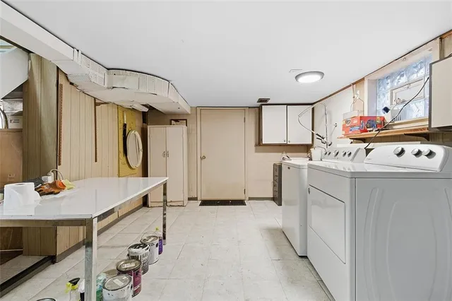 a open kitchen with stainless steel appliances granite countertop a stove refrigerator and cabinets