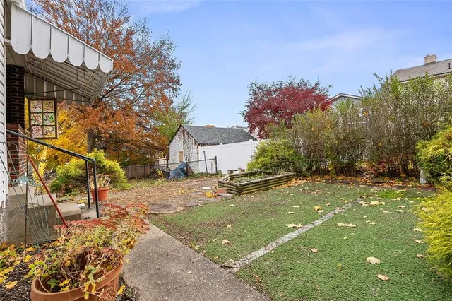 a view of a backyard with a house