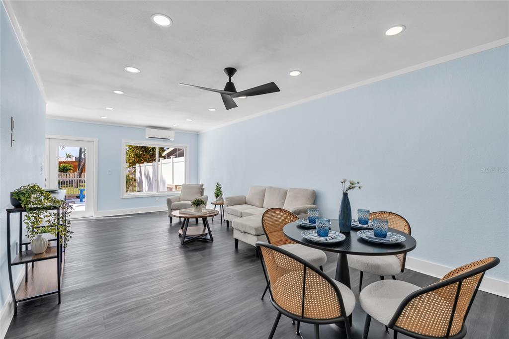 445 63rd Street Holmes Beach, FL 34217 - Photo 11 of 45 a living room with furniture and wooden floor