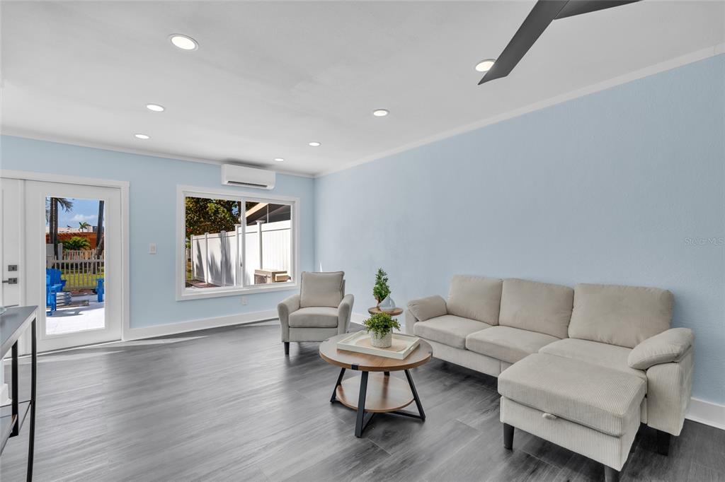 445 63rd Street Holmes Beach, FL 34217 - Photo 14 of 45 a living room with furniture and a window