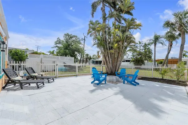a view of a park with sitting area