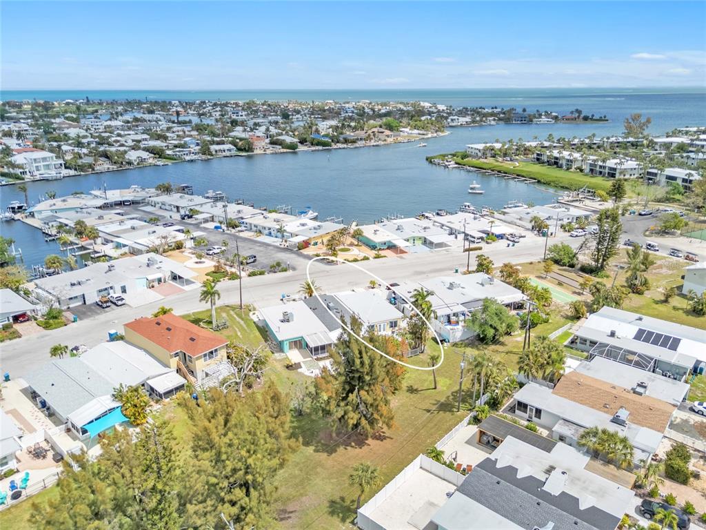 445 63rd Street Holmes Beach, FL 34217 - Photo 44 of 45 an aerial view of a house with a lake view