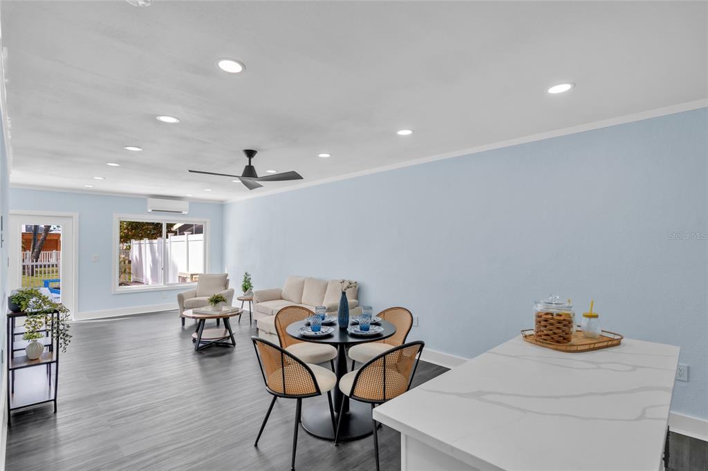 445 63rd Street Holmes Beach, FL 34217 - Photo 7 of 45 a dining room with furniture and window