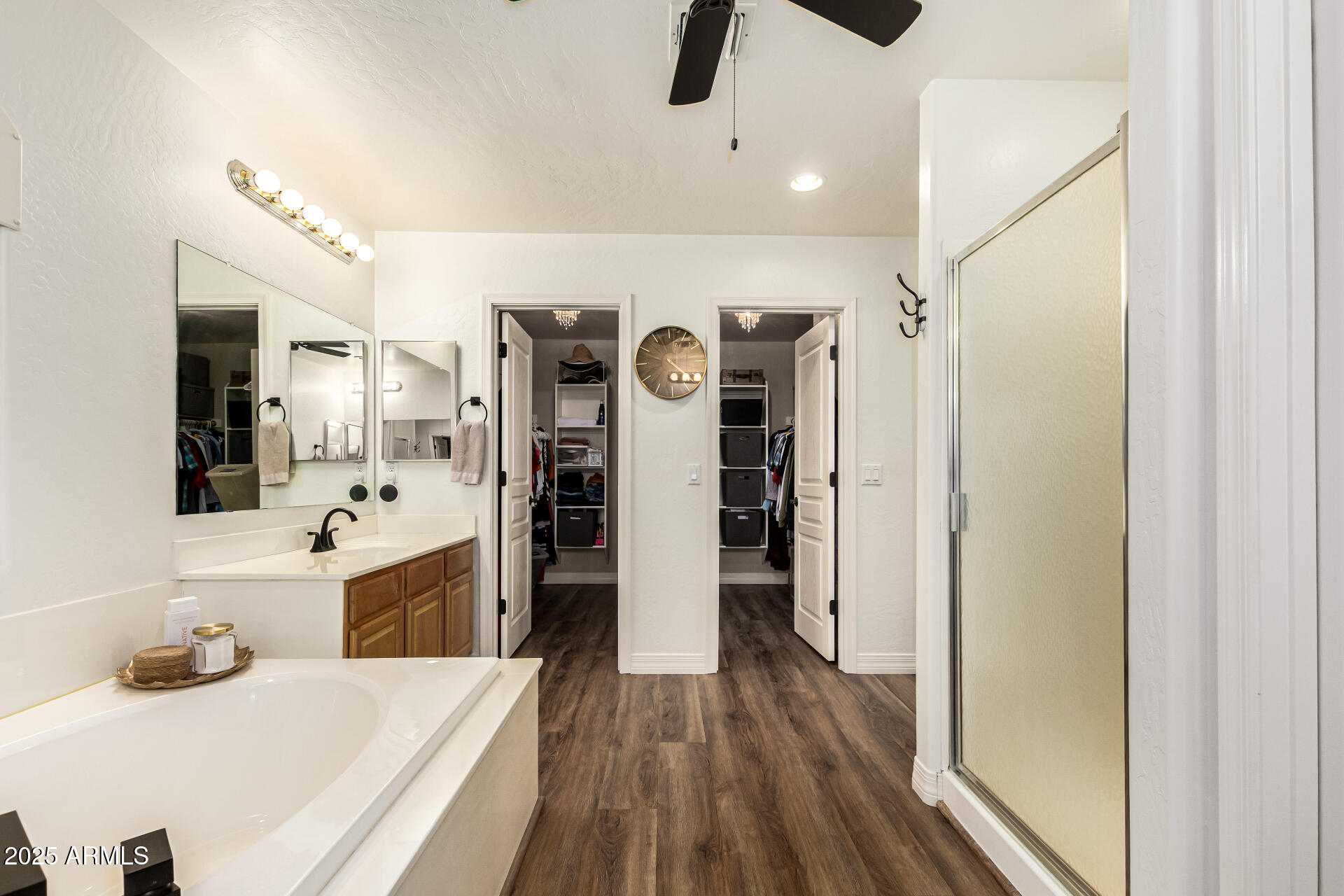 3721 South Martingale Road Gilbert, AZ 85297 - Photo 49 of 67 a kitchen with stainless steel appliances a refrigerator and wooden floor