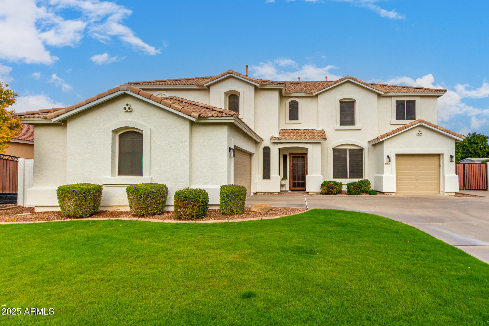 3721 South Martingale Road Gilbert, AZ 85297 - Photo 6 of 67 a front view of a house with a yard and porch