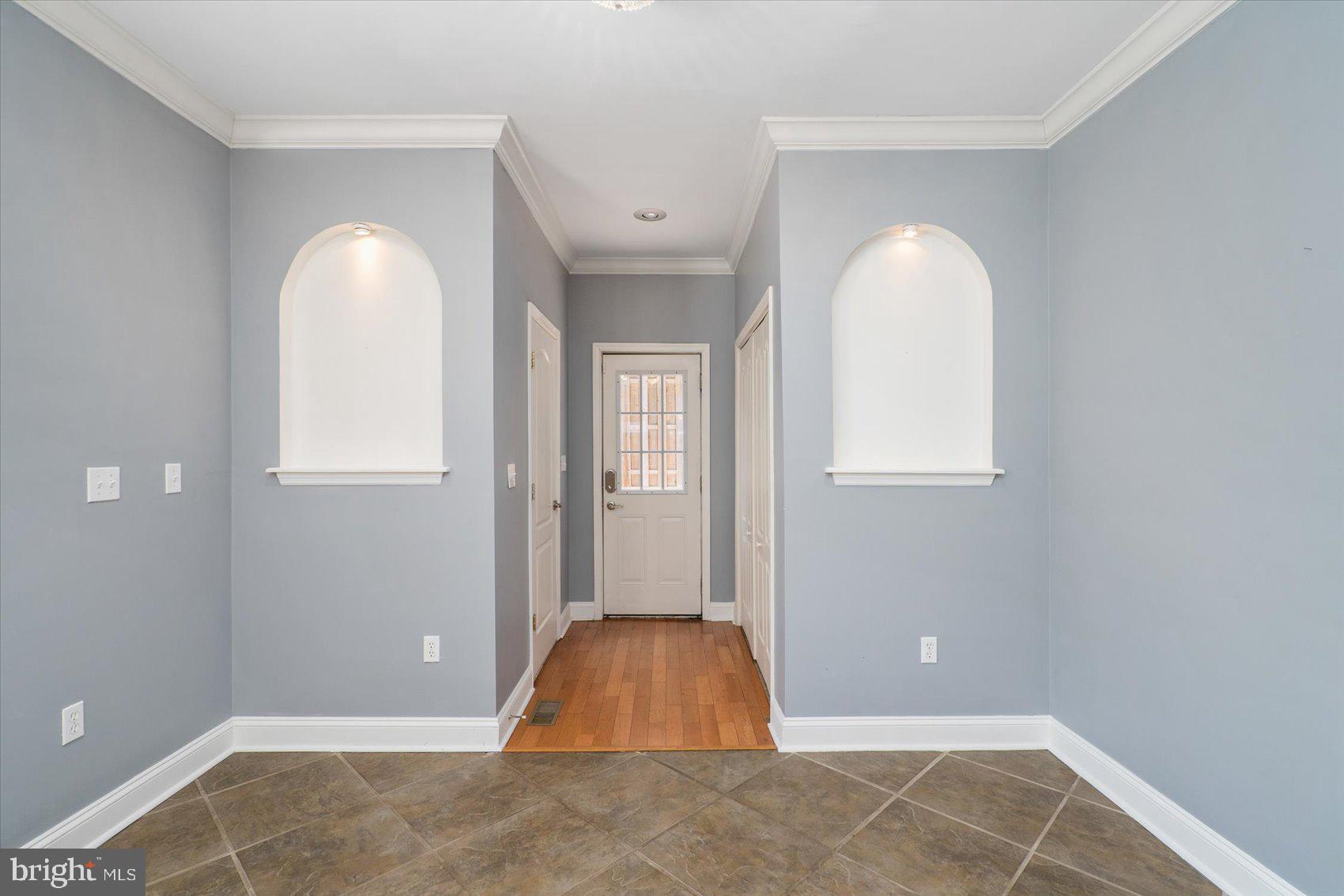 104 North Patterson Park Avenue Baltimore, MD 21231 - Photo 16 of 38 an empty room with windows and closet