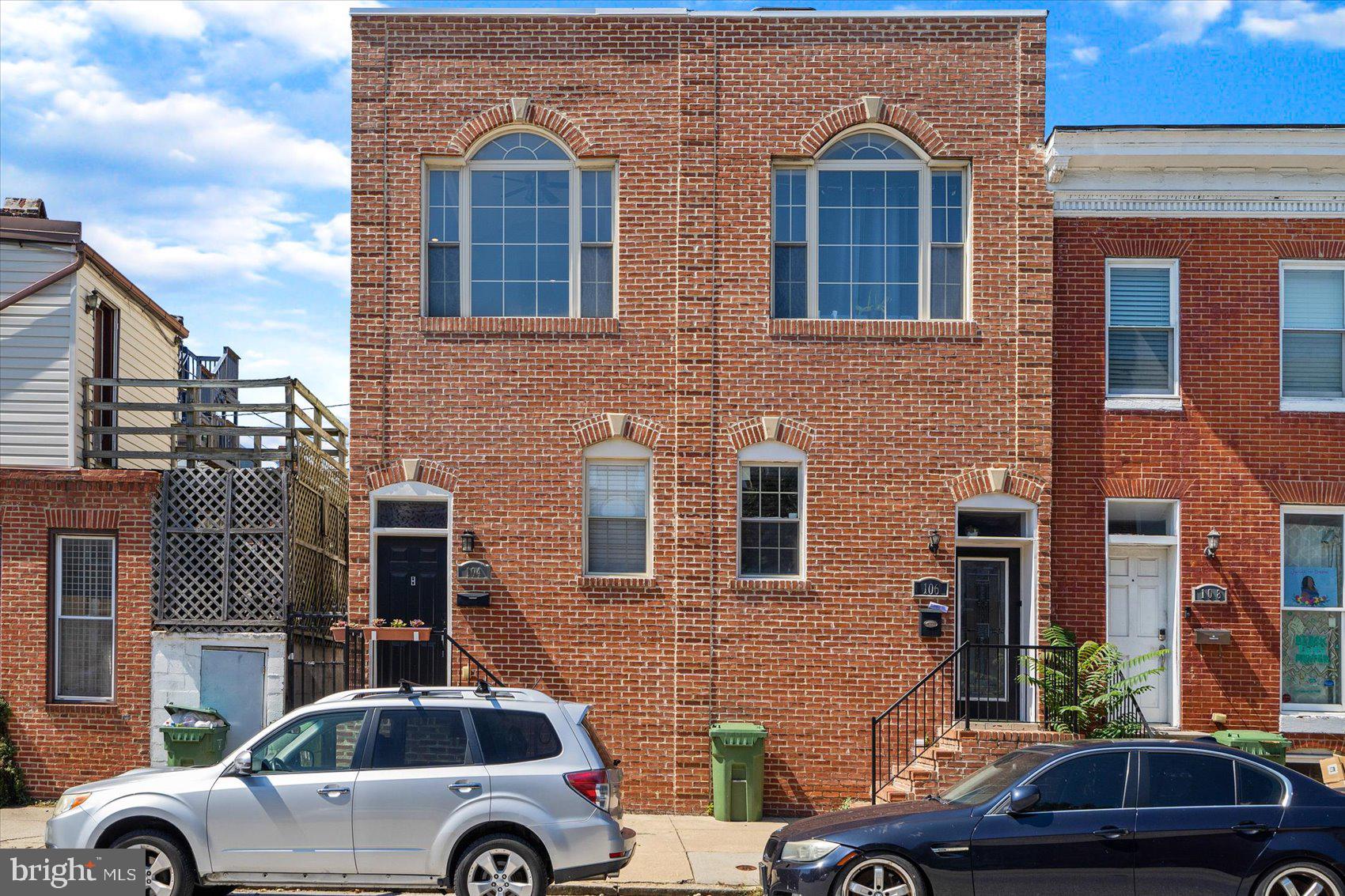 104 North Patterson Park Avenue Baltimore, MD 21231 - Photo 2 of 38 a front view of a house with parking space