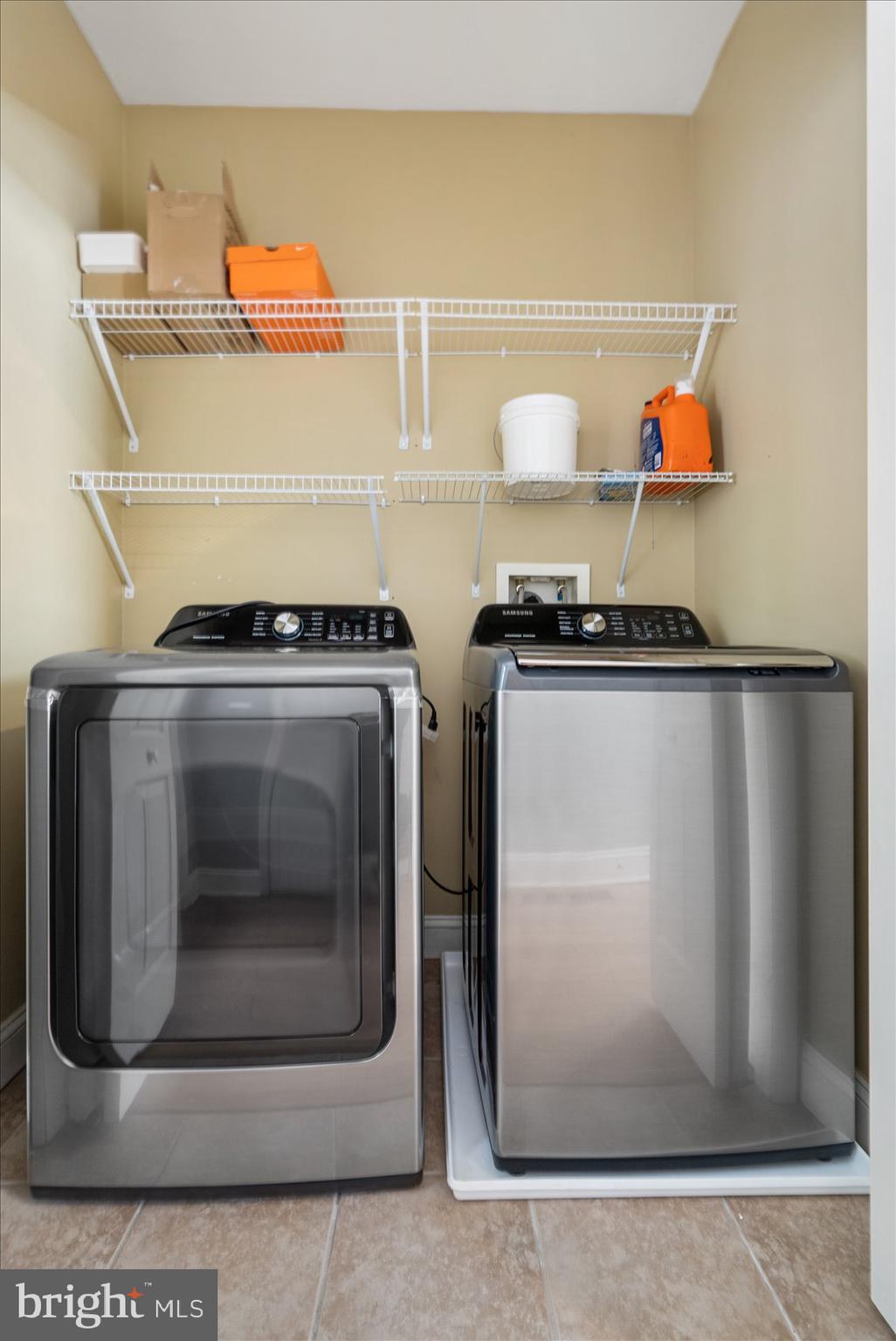 104 North Patterson Park Avenue Baltimore, MD 21231 - Photo 21 of 38 a stove top oven sitting inside of a kitchen