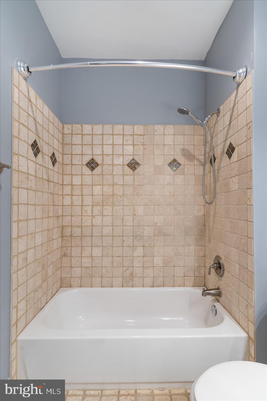 104 North Patterson Park Avenue Baltimore, MD 21231 - Photo 23 of 38 a bathroom with a shower and a bathtub