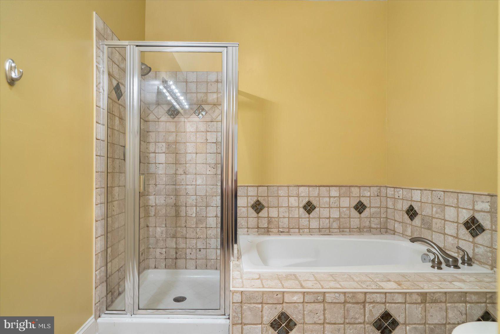 104 North Patterson Park Avenue Baltimore, MD 21231 - Photo 27 of 38 a bathroom with a bathtub and shower