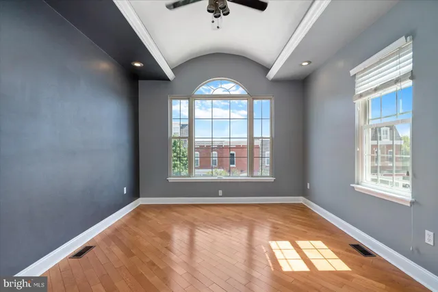 a view of an empty room with a window