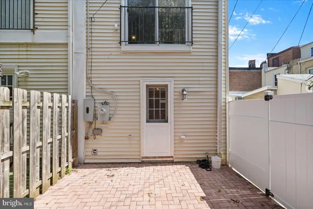 a view of a house with a door and a window