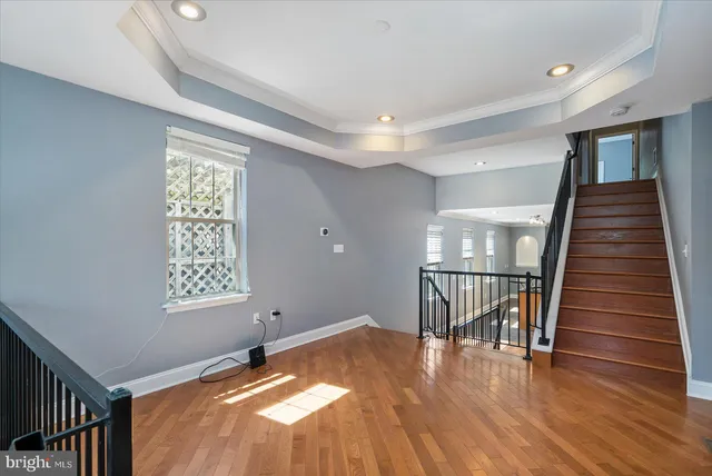 a view of entryway with wooden floor