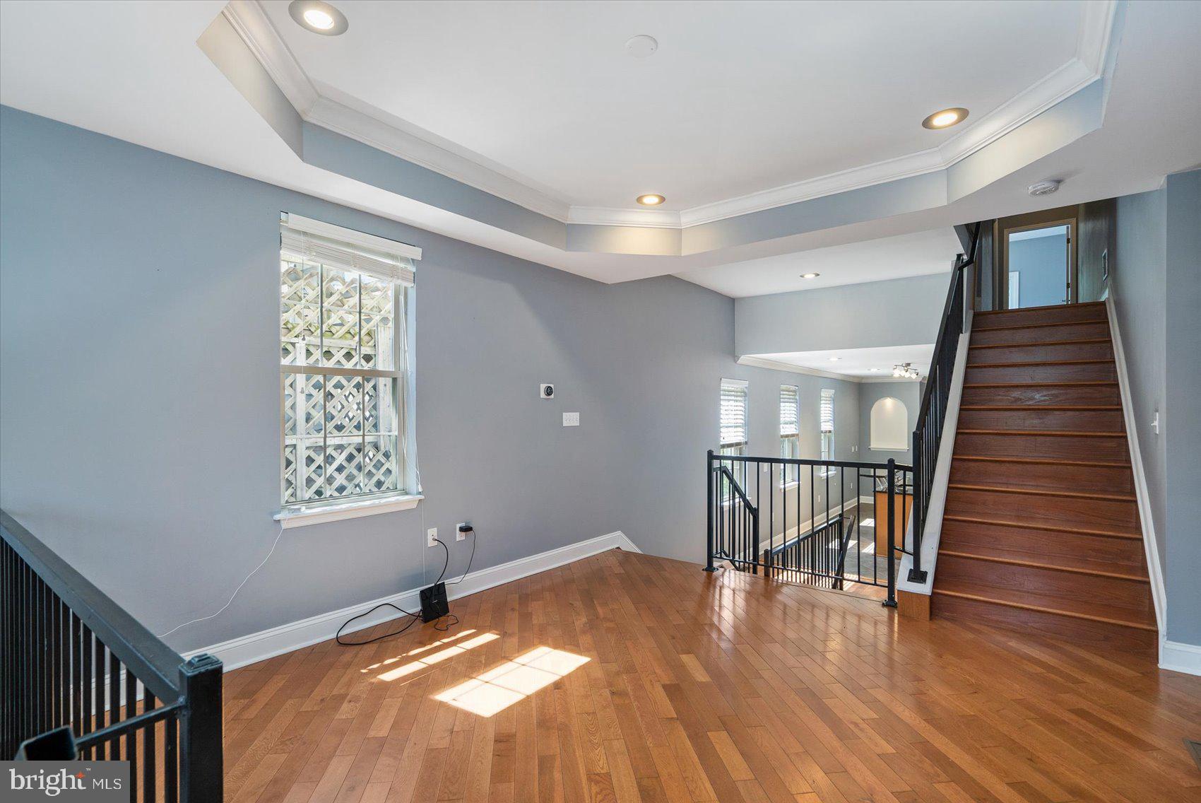 104 North Patterson Park Avenue Baltimore, MD 21231 - Photo 4 of 38 a view of entryway with wooden floor