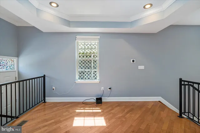 a view of an empty room with a window