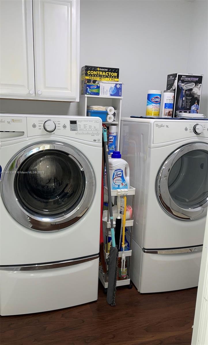 4292 Southwest Paley Road Port St. Lucie, FL 34953 - Photo 11 of 21 a utility room with dryer and washer