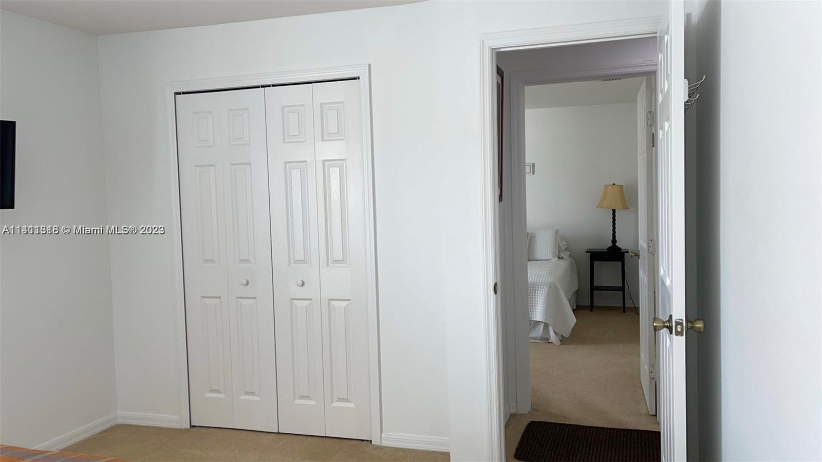 4292 Southwest Paley Road Port St. Lucie, FL 34953 - Photo 16 of 21 a view of a room with closet area