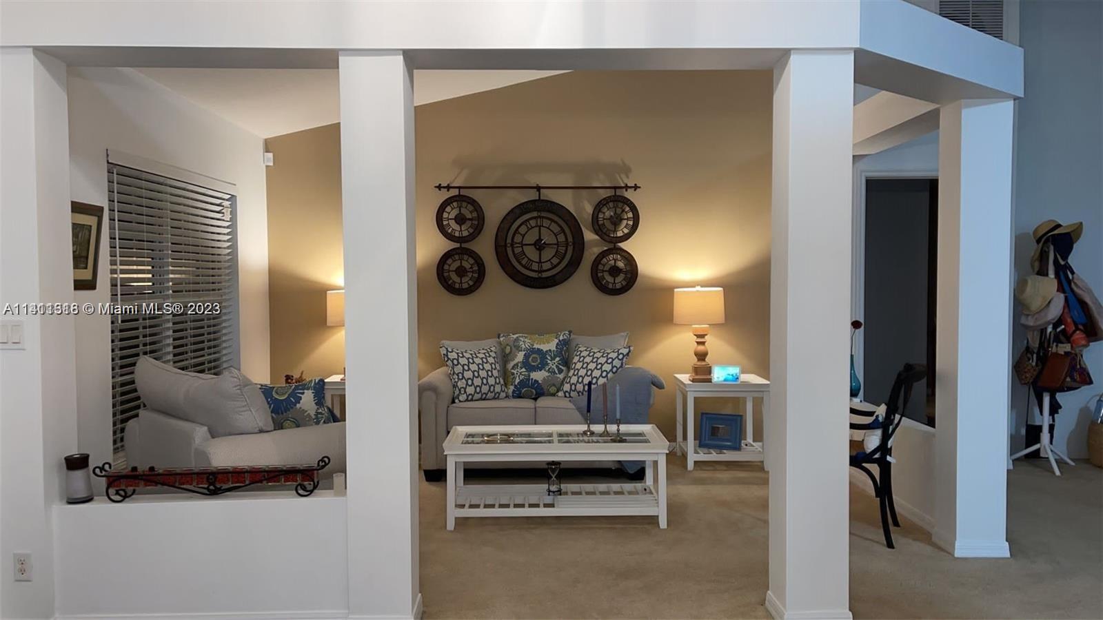 4292 Southwest Paley Road Port St. Lucie, FL 34953 - Photo 4 of 21 a view of living room with furniture and a window
