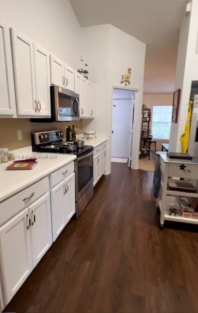 4292 Southwest Paley Road Port St. Lucie, FL 34953 - Photo 10 of 21 a kitchen with appliances a sink and cabinets