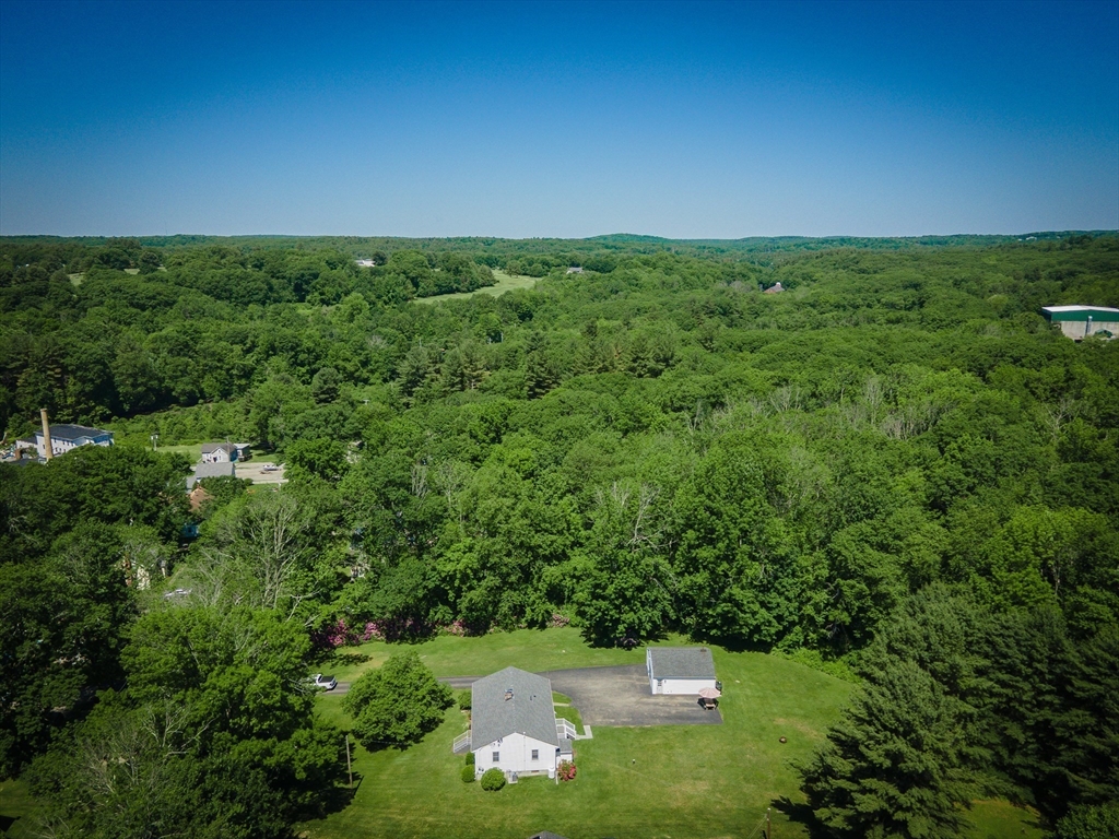 27 Comins Road North Oxford, MA 01537 - Photo 28 of 32 a view of an outdoor space and a yard