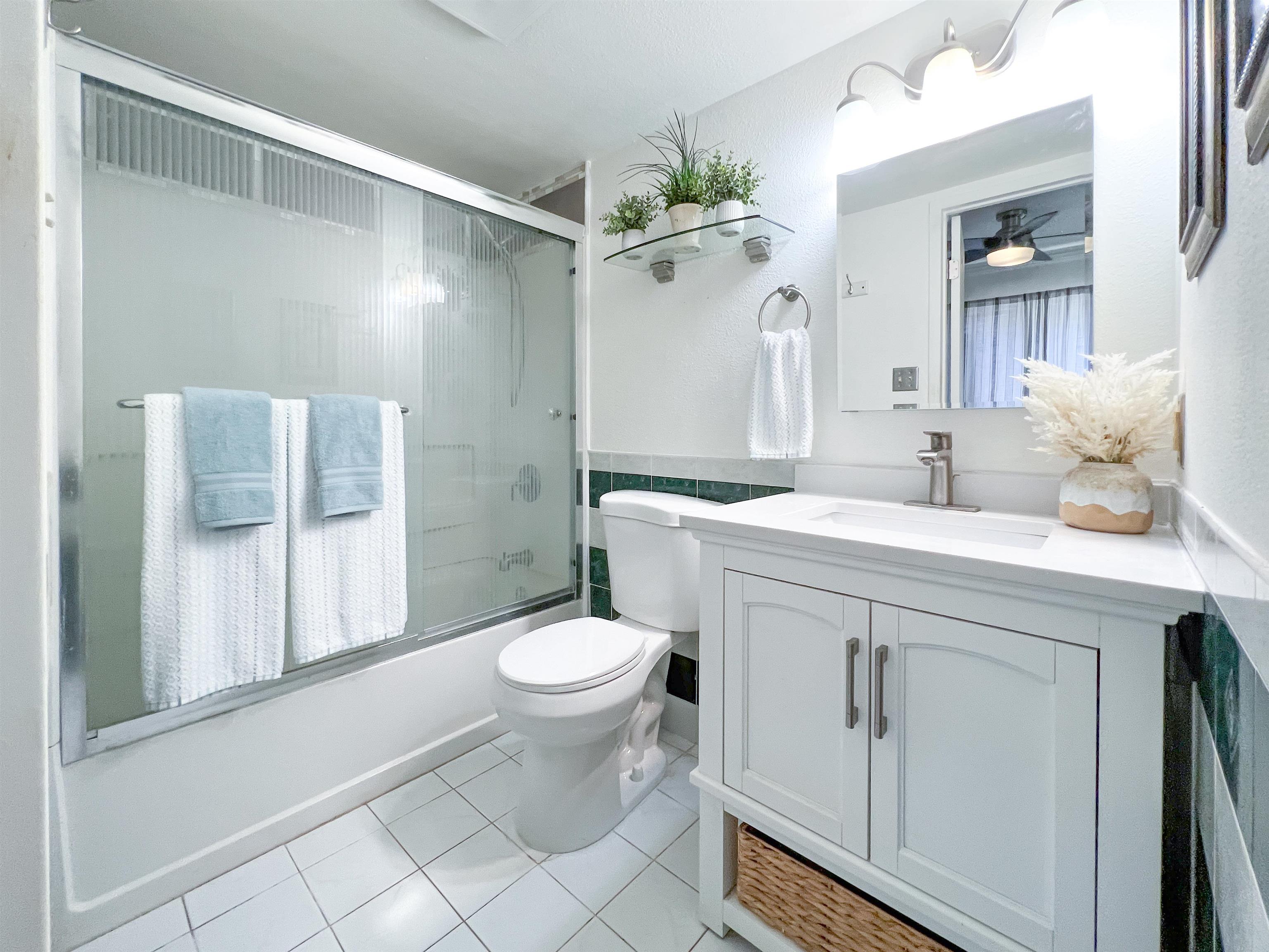 2219 South Kihei Road, Unit A314 Kihei, HI 96753 - Photo 13 of 20 a bathroom with a sink toilet and shower