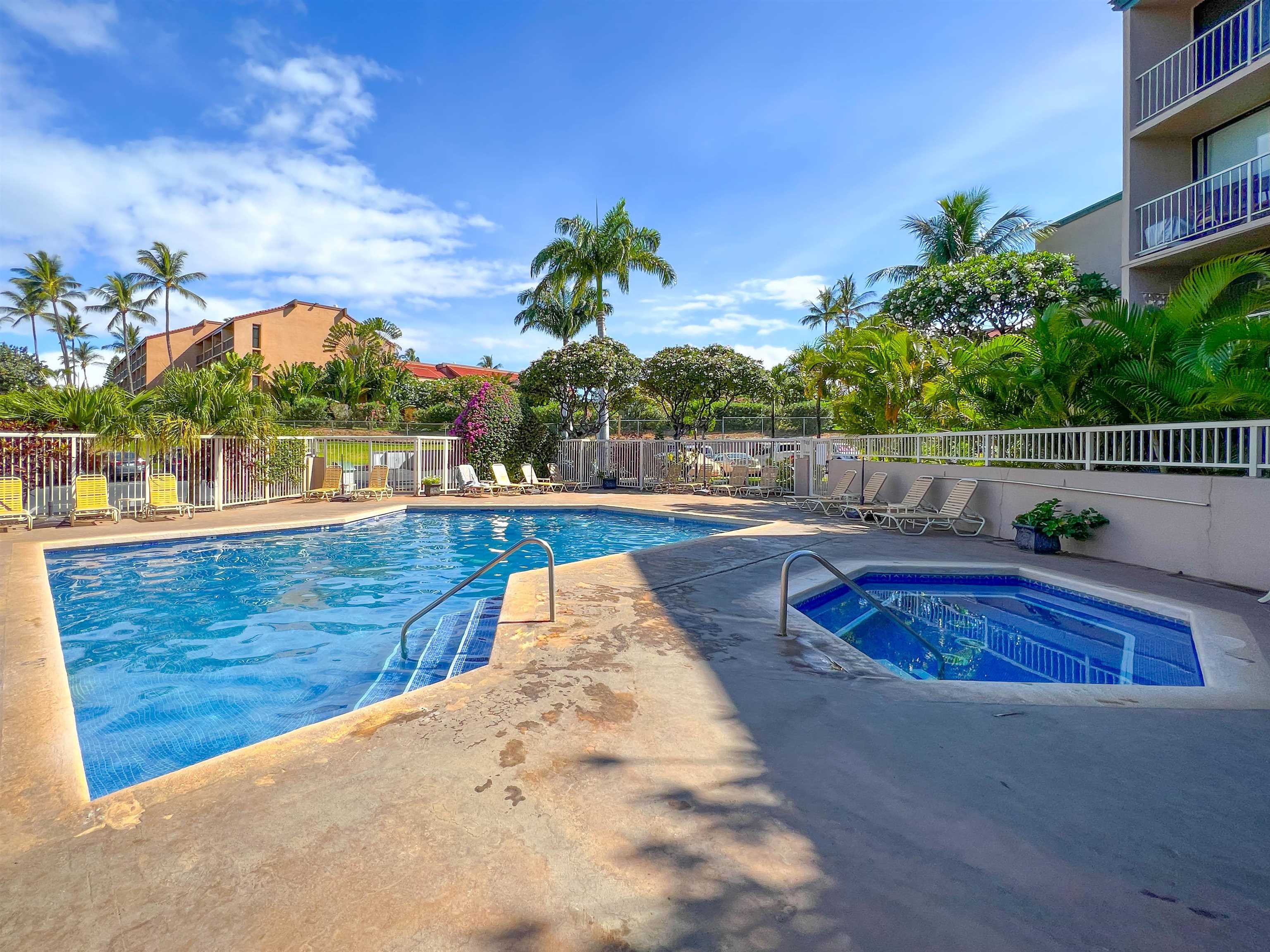 2219 South Kihei Road, Unit A314 Kihei, HI 96753 - Photo 16 of 20 a view of swimming pool with outdoor seating and plants