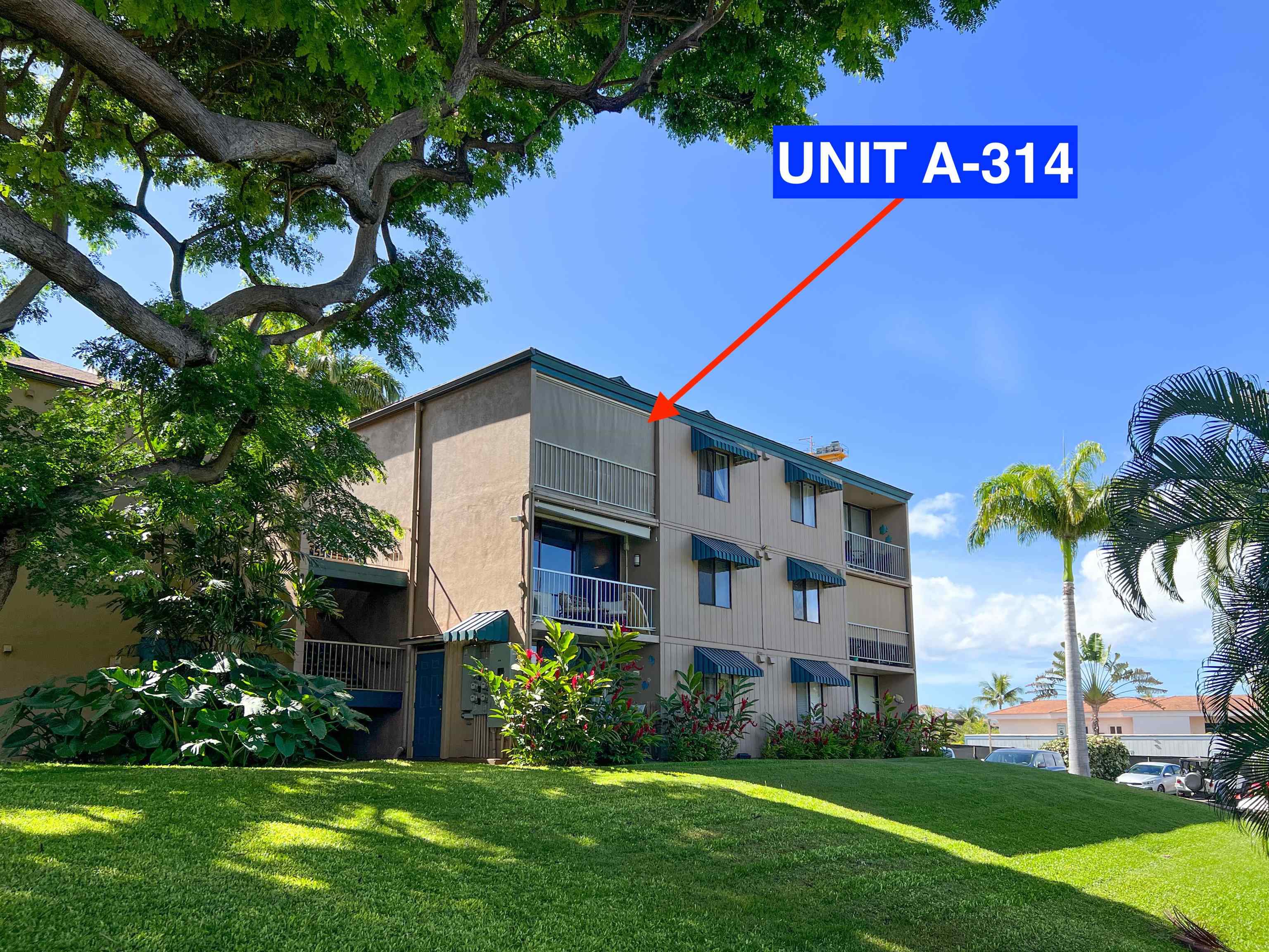 2219 South Kihei Road, Unit A314 Kihei, HI 96753 - Photo 18 of 20 a sign that is on the side of a road