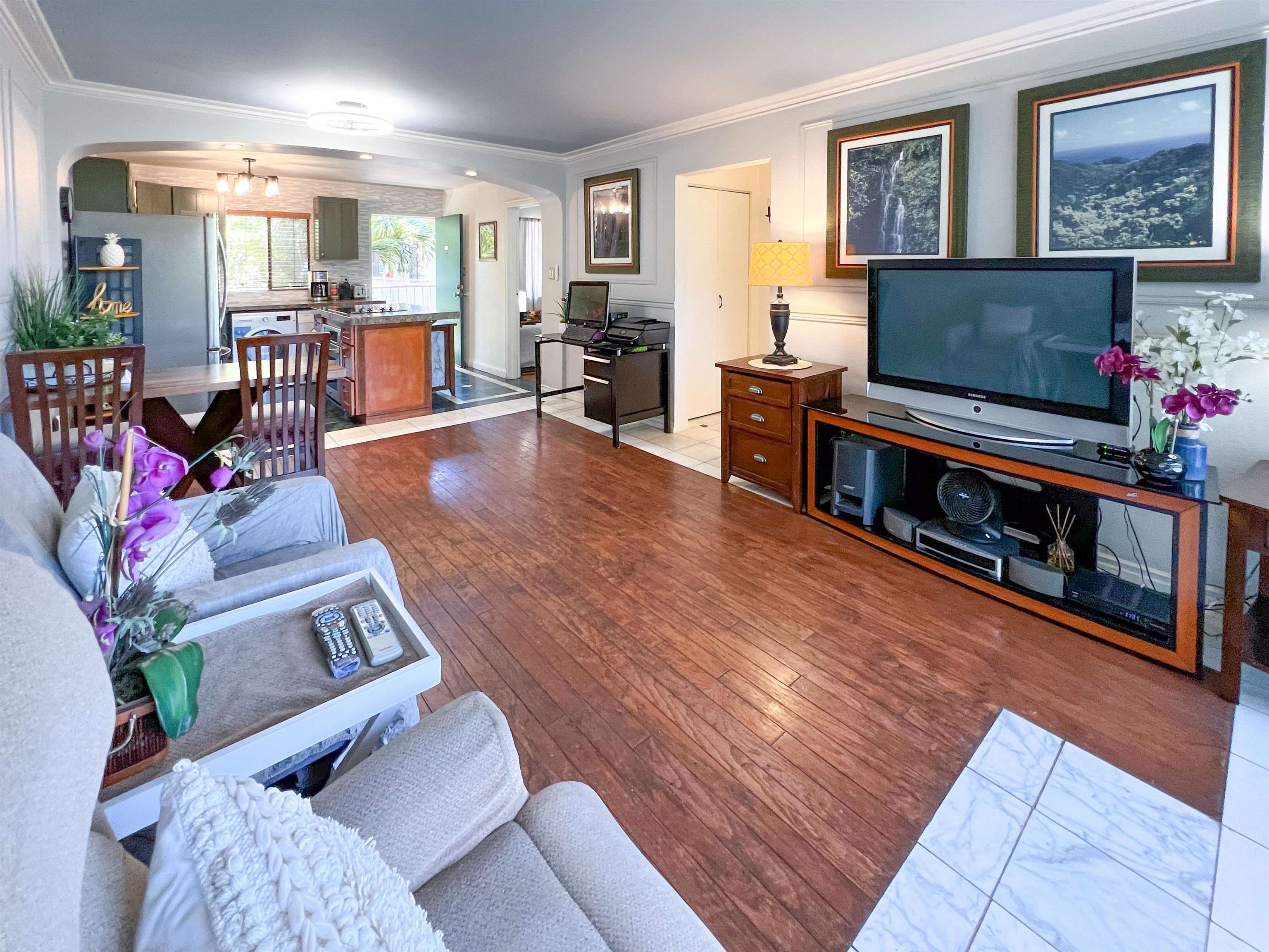 2219 South Kihei Road, Unit A314 Kihei, HI 96753 - Photo 4 of 20 a living room with furniture and a flat screen tv