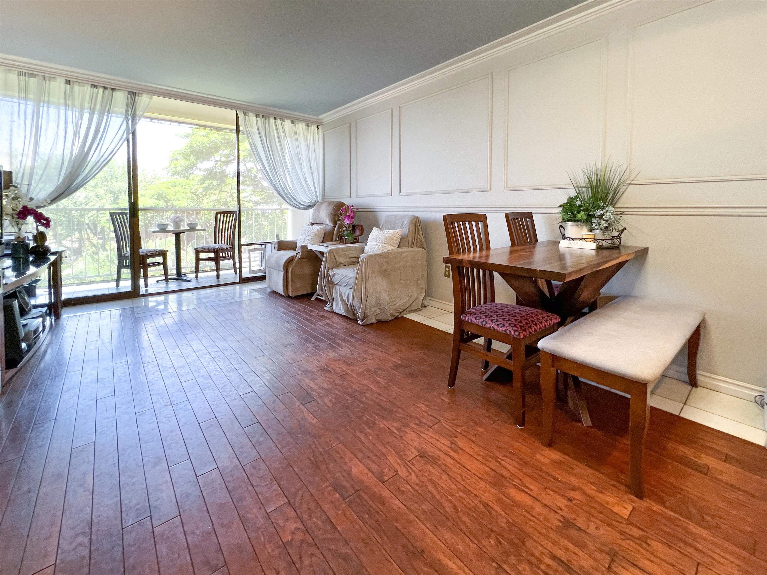2219 South Kihei Road, Unit A314 Kihei, HI 96753 - Photo 5 of 20 a living room with furniture and a wooden floor