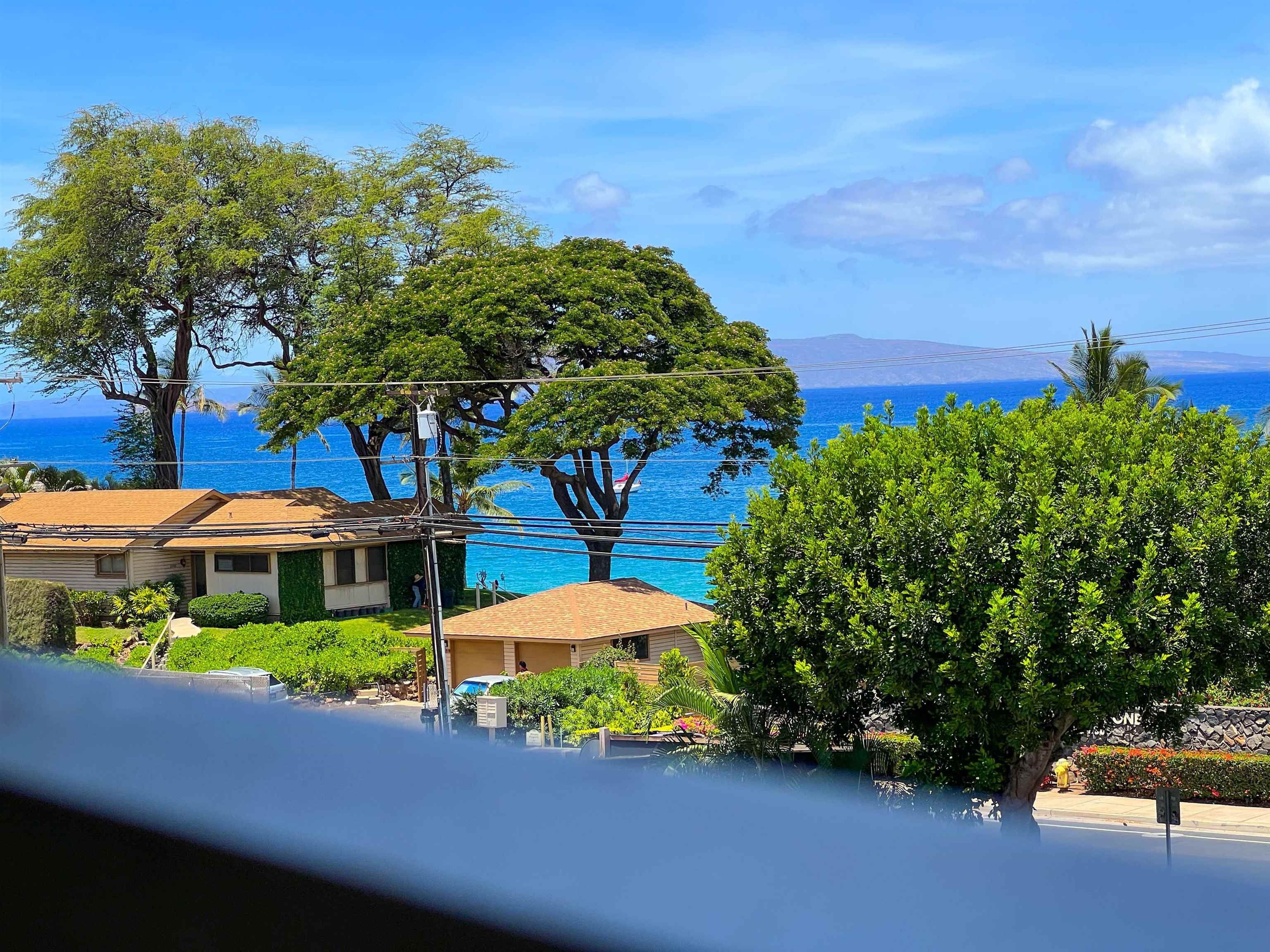 2219 South Kihei Road, Unit A314 Kihei, HI 96753 - Photo 7 of 20 a view of a lawn with furniture and a yard