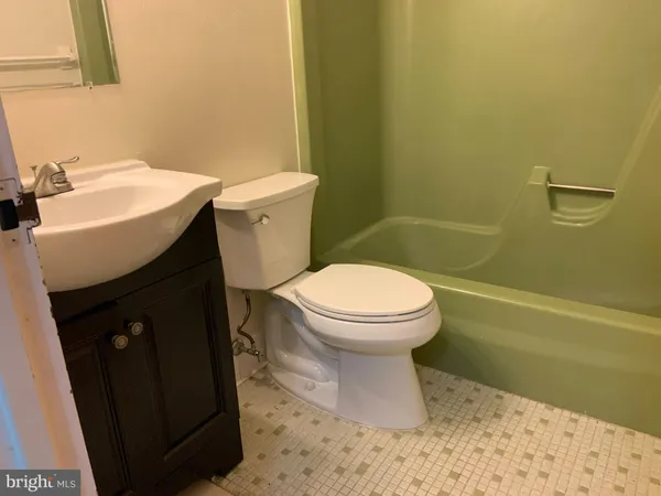a bathroom with a sink and a toilet