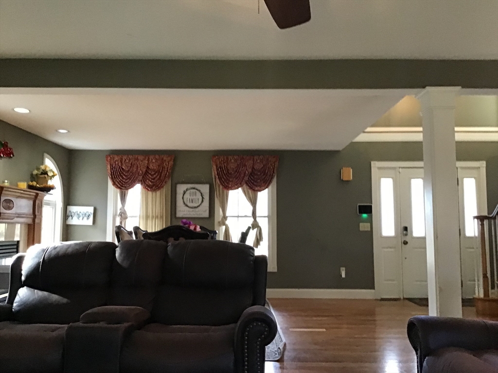 299 Three Rivers Road Wilbraham, MA 01095 - Photo 16 of 32 a living room with furniture and a large window