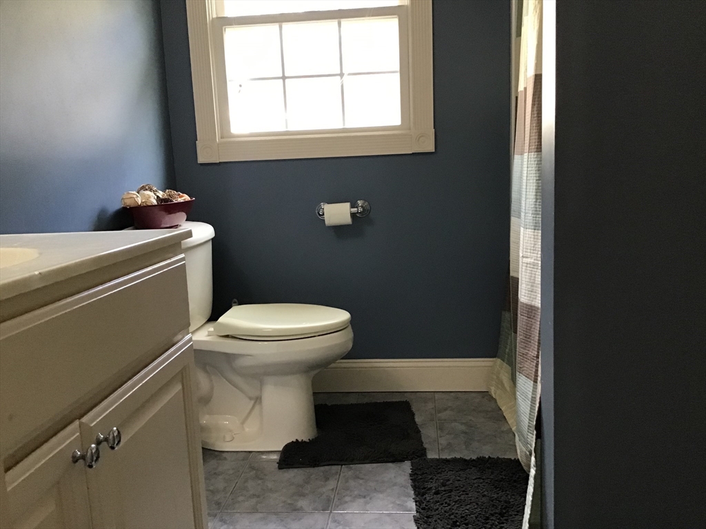 299 Three Rivers Road Wilbraham, MA 01095 - Photo 22 of 32 a bathroom with a toilet and a shower