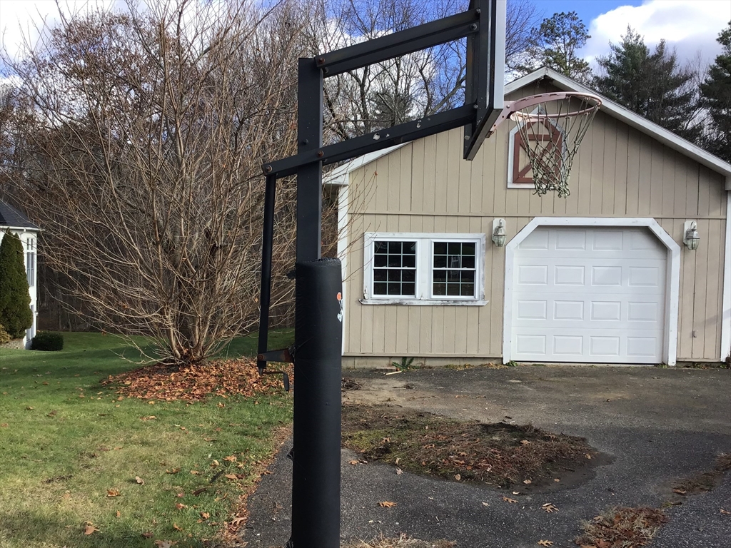299 Three Rivers Road Wilbraham, MA 01095 - Photo 4 of 32 a view of a house with a yard