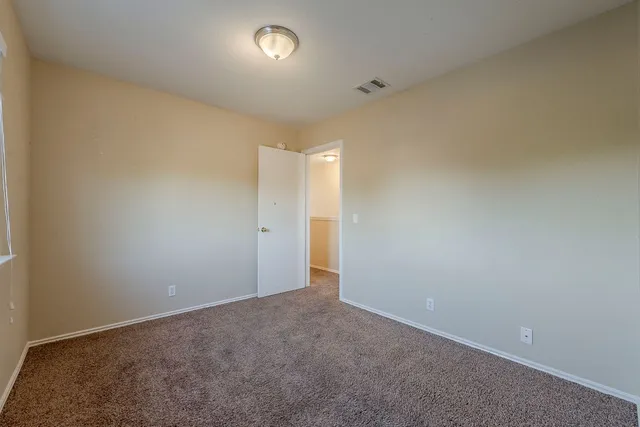 an empty room with an entryway