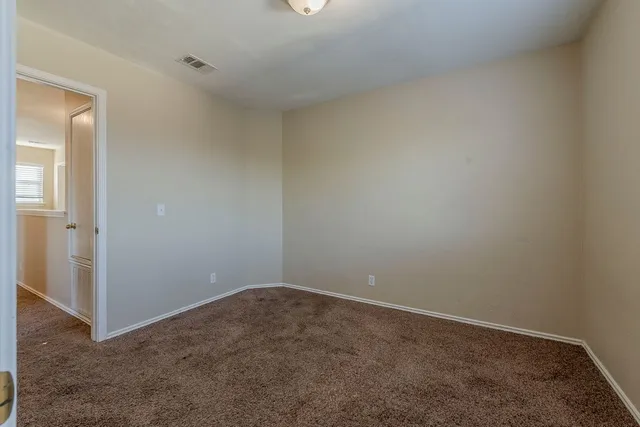 an empty room with closet
