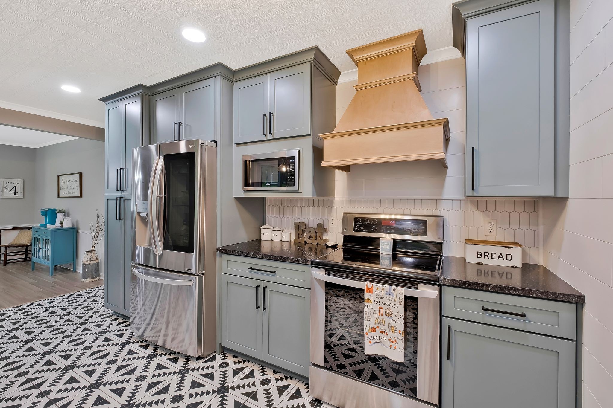 345 Lock 5 Road Lebanon, TN 37087 - Photo 14 of 50 Wall of cabinets with pantry, microwave space, wood stove hood, tile back splash and granite countertops!