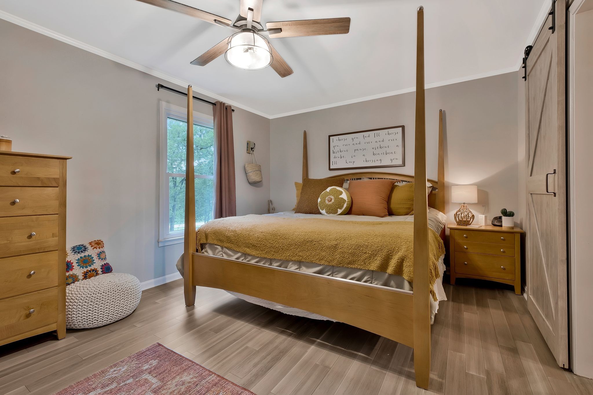 345 Lock 5 Road Lebanon, TN 37087 - Photo 16 of 50 Primary bedroom downstairs with barn door to primary bath.