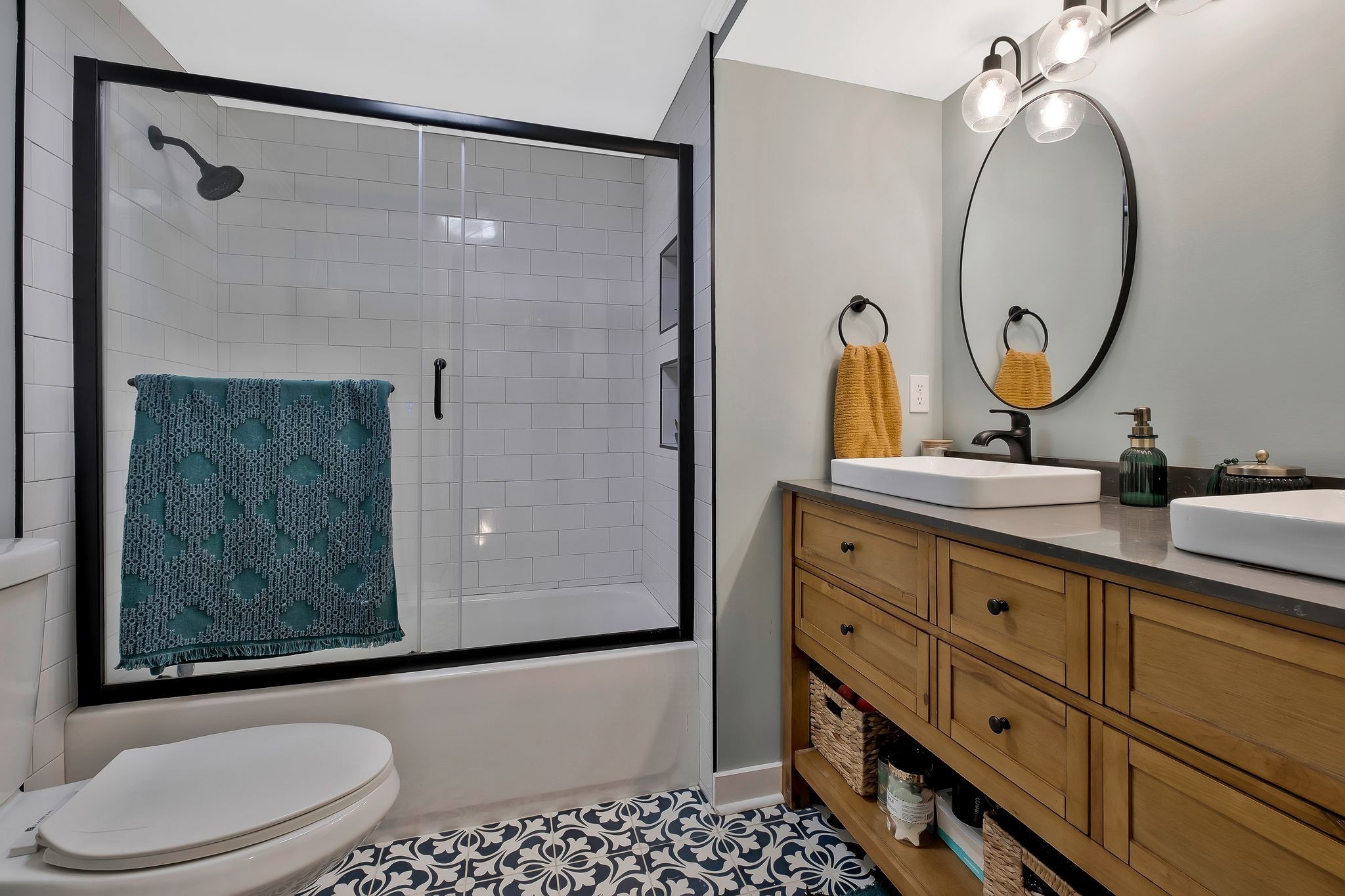 345 Lock 5 Road Lebanon, TN 37087 - Photo 26 of 50 Upstairs bath with tile and glass doors. Double vanities and tile floor.