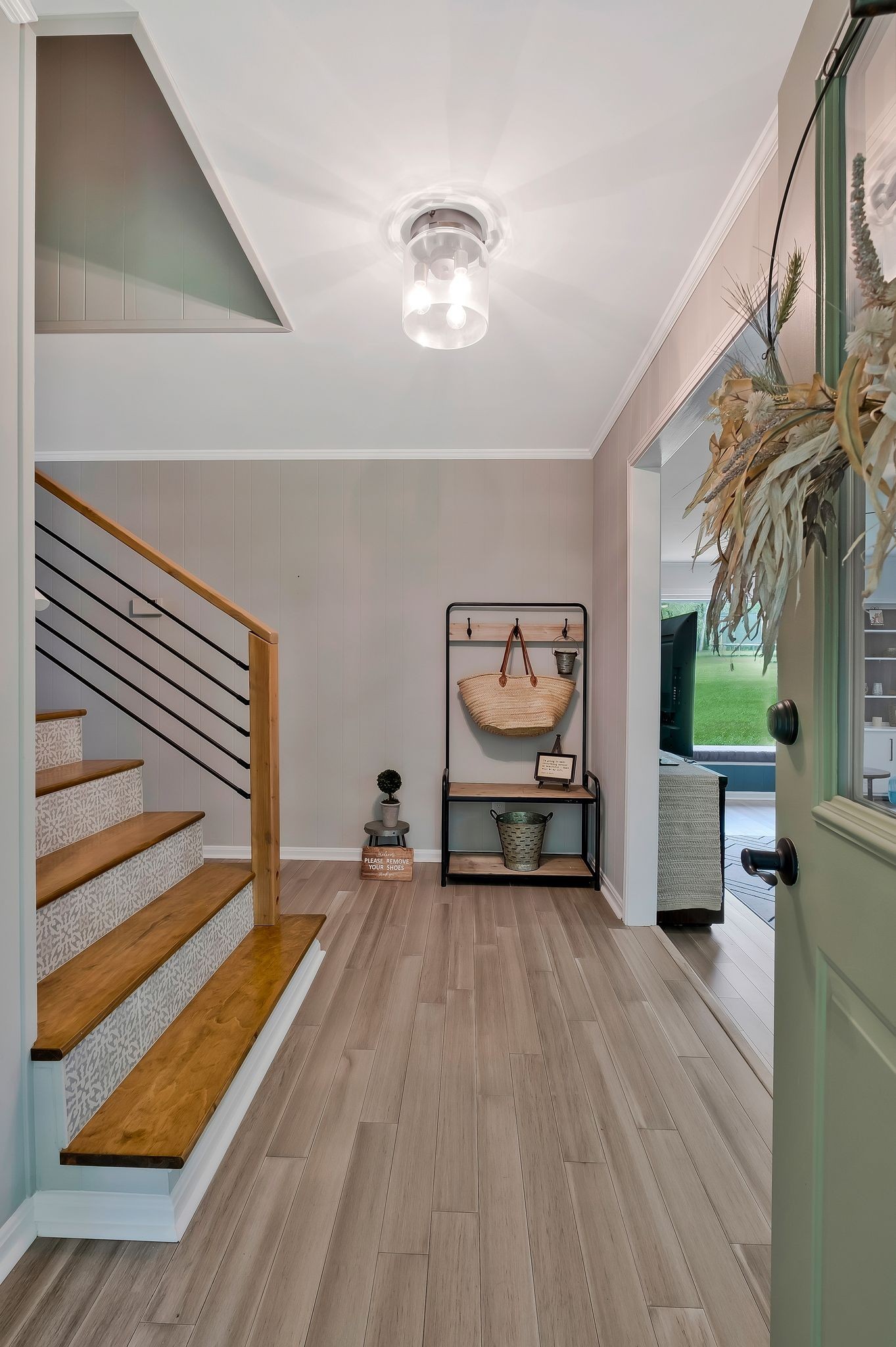 345 Lock 5 Road Lebanon, TN 37087 - Photo 6 of 50 Welcoming foyer with bamboo wood flooring, new light fixture and stairs with wood and tile!