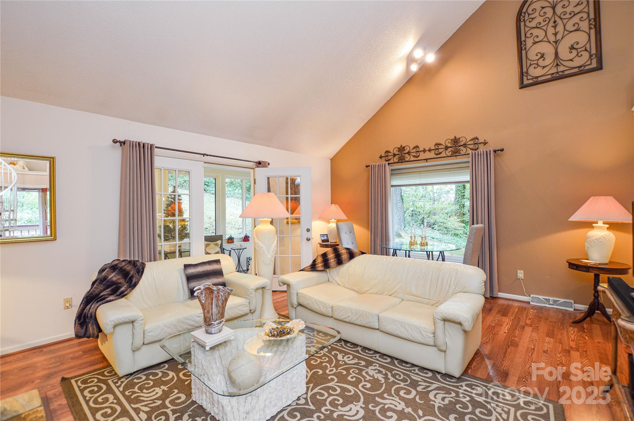 230 Ravine Circle Southeast Concord, NC 28025 - Photo 9 of 25 a living room with furniture and a large window