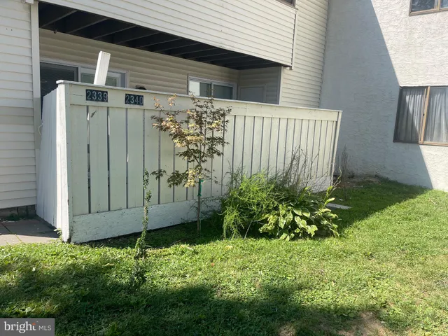 a view of a back yard of the house