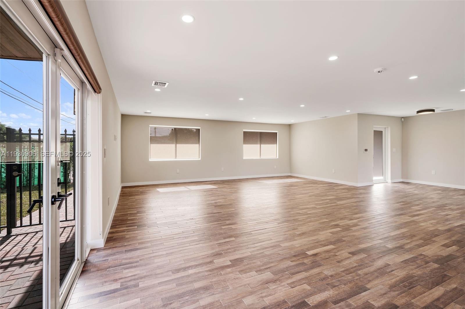 6701 Southwest 49th Terrace Miami, FL 33155 - Photo 18 of 35 a view of a livingroom with wooden floor